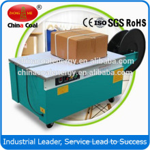 Semi automatic newspaper tying strapping machine